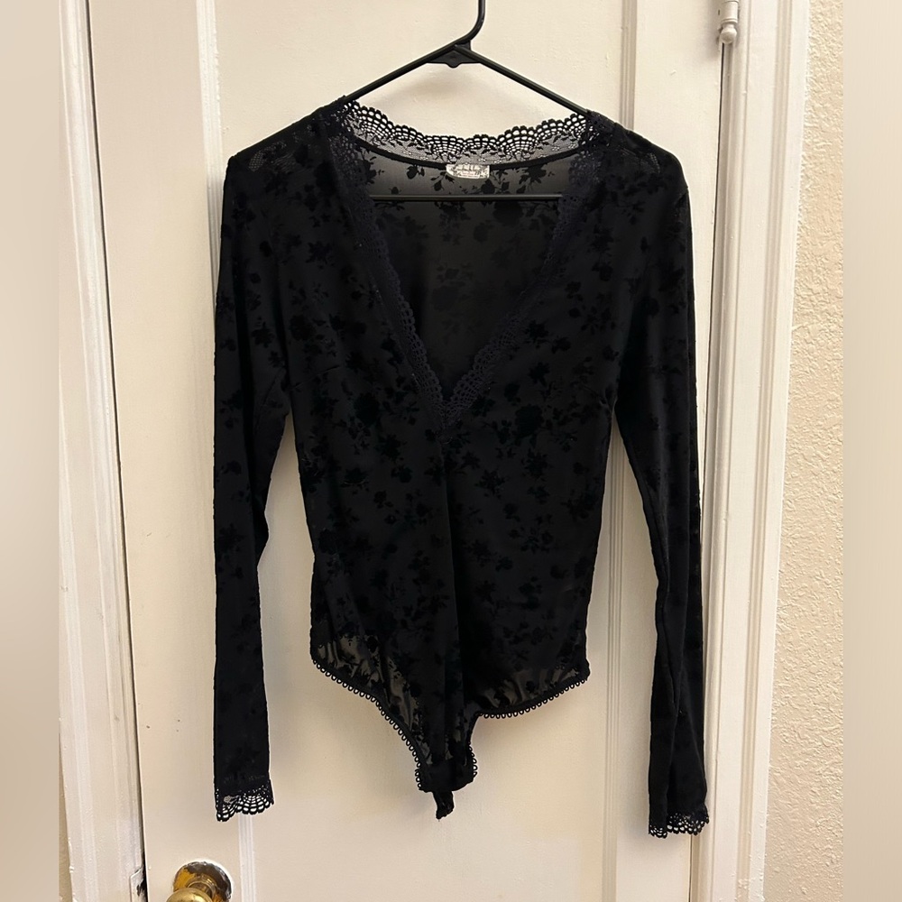 Free People bodysuit - sheer, black Velvet. Good condition. Size Small.